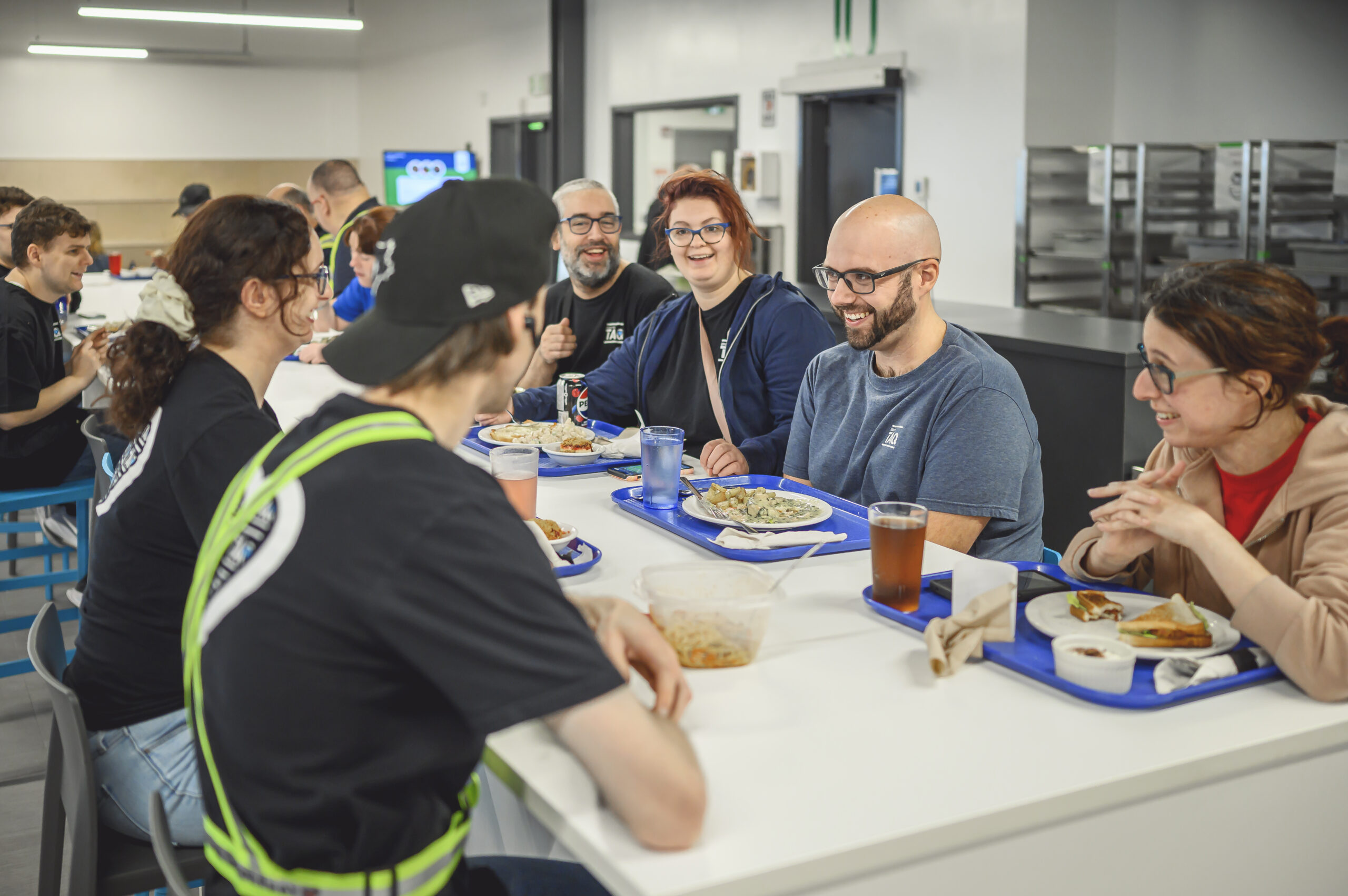 Milieu de vie cafeteria sourire TAQ